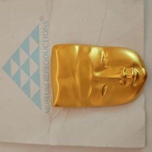 CHINESE MASK in Soft Goldtone  that is a Museum Reproduction Brooch
